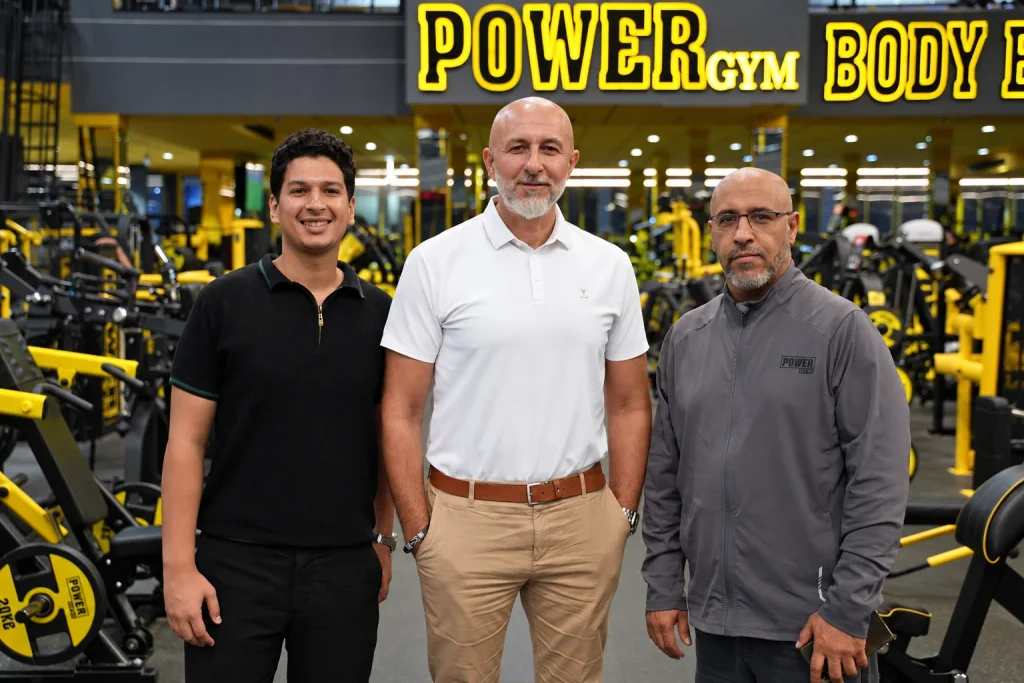 Fadel Al-Ghazal of Power Company with Profit Sports Solutions representatives at Power Gym Al Ahsa