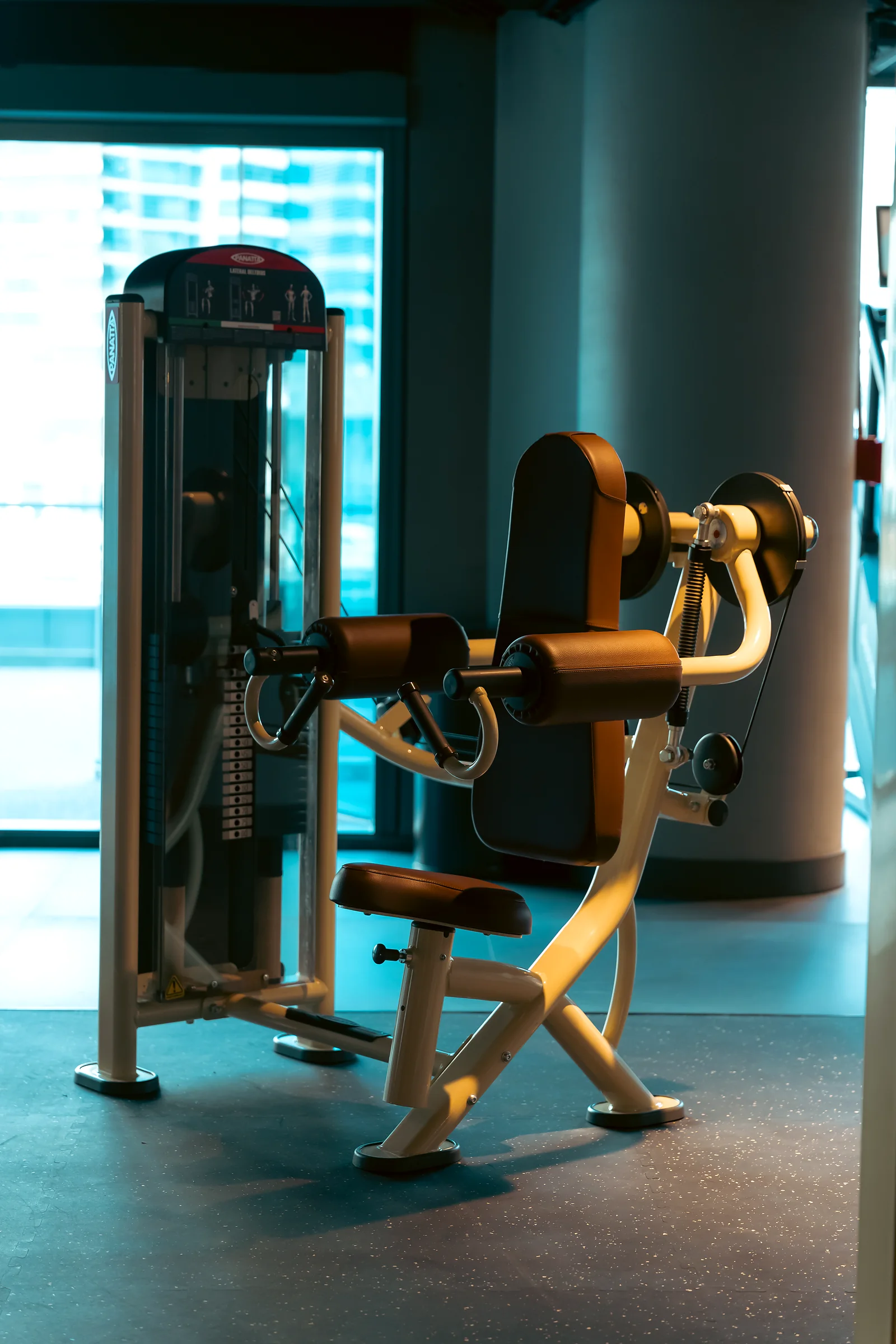 Multi-station strength machine in a modern gym interior