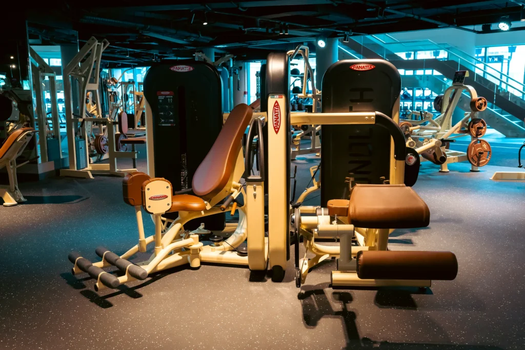 Panatta strength machines in a cream and brown finish across the ARKHE Dubai Marina training floor